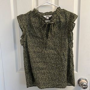 Black blouse with yellow flower pattern